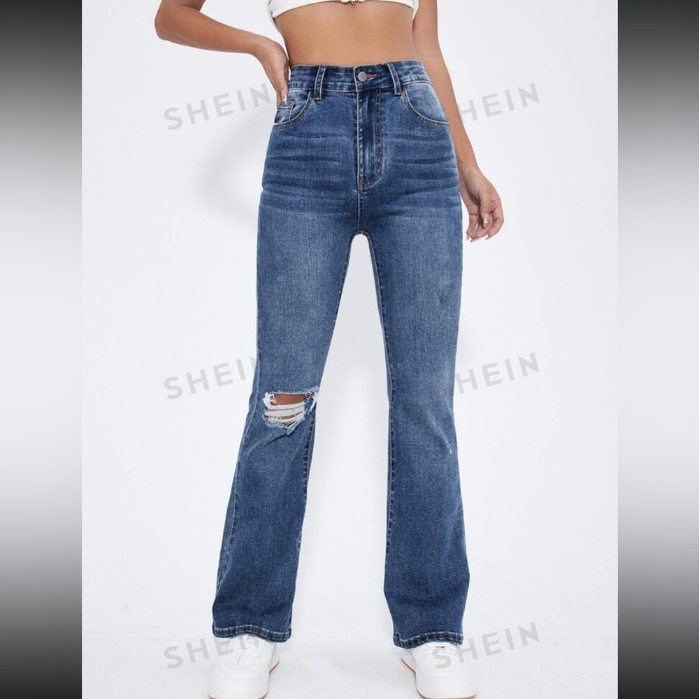 High Waist Ripped Flare Leg Jeans • Size 6